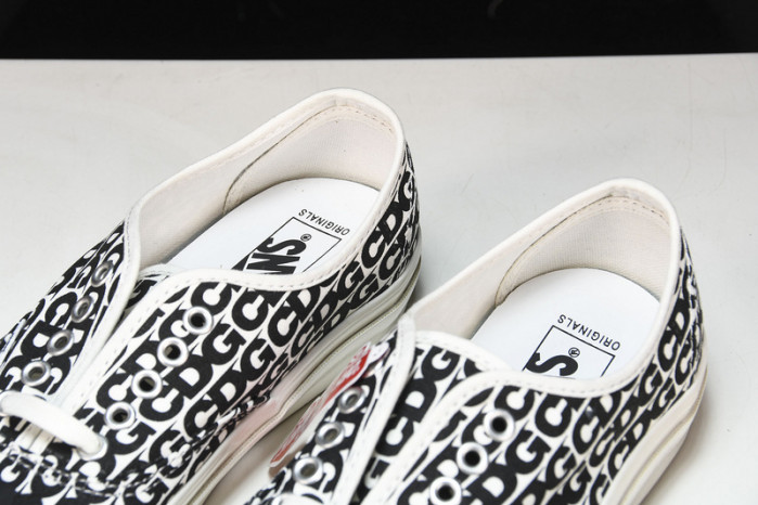 comme des garcons x authentic 
